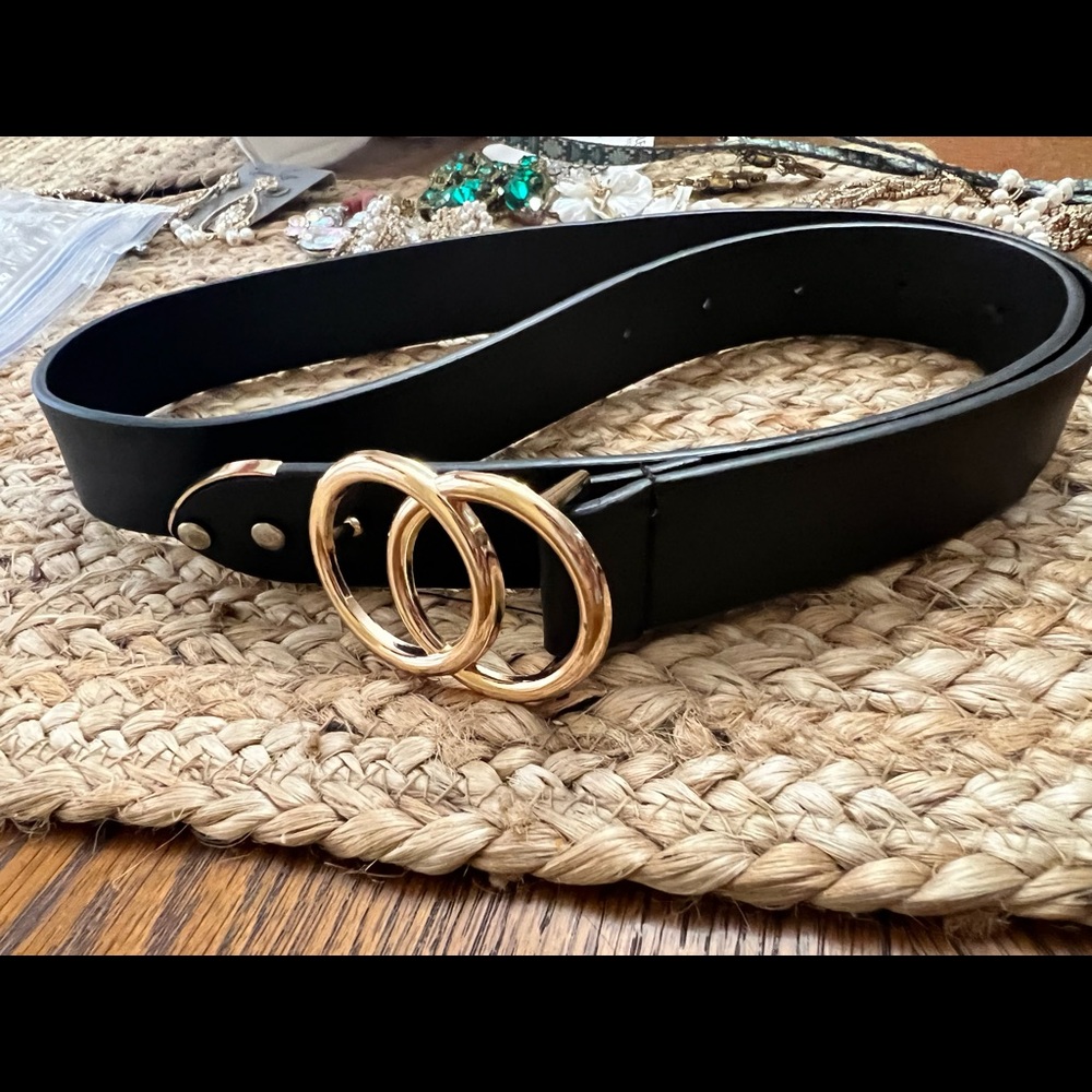 Black belt with gold buckle